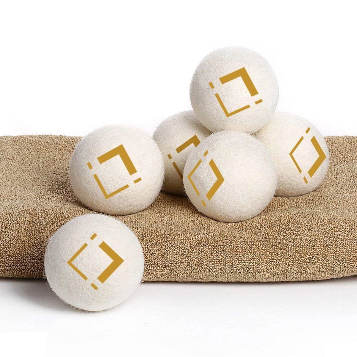 LuxerLiving Wasbol Set Van 6 - Droogt Tot 30% Sneller - Wasverzachter - Droger Ballen - Dryer Balls - Ecologisch - 100% Wol 2 LuxerLiving Wasbol Set Van 6 - Droogt Tot 30% Sneller - Wasverzachter - Droger Ballen - Dryer Balls - Ecologisch - 100% Wol - Afbeelding 2